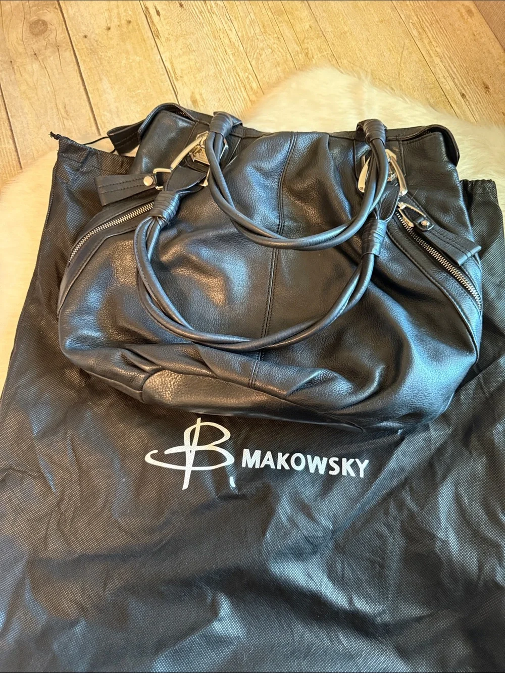 B. Makowsky Black Leather Hobo Bag with heavy silver hardware